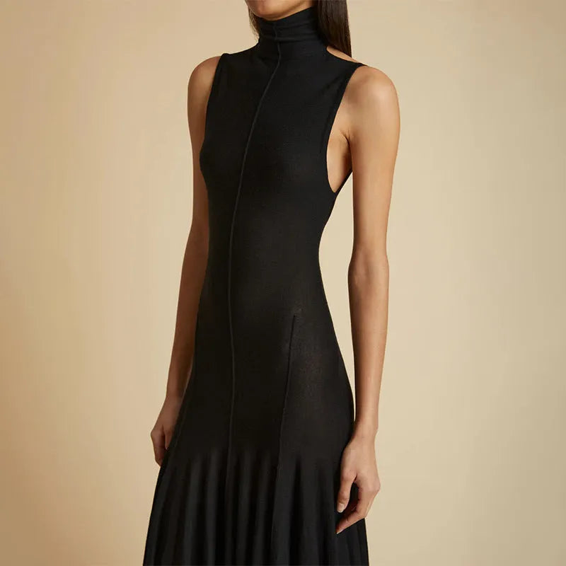 Grey slim-fit women's cotton dress with half turtleneck and backless design.