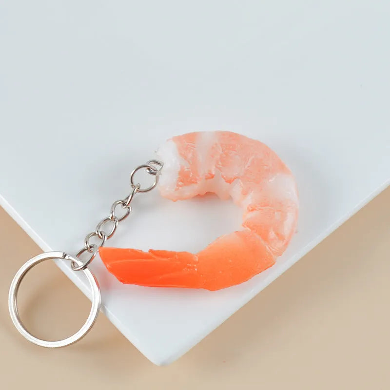 PVC injection moulded shrimp shaped keychain with 1.5cm thickness and door buckle attachment