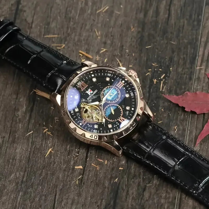 Men's black and rose gold automatic skeleton watch with a large dial and brown leather strap.