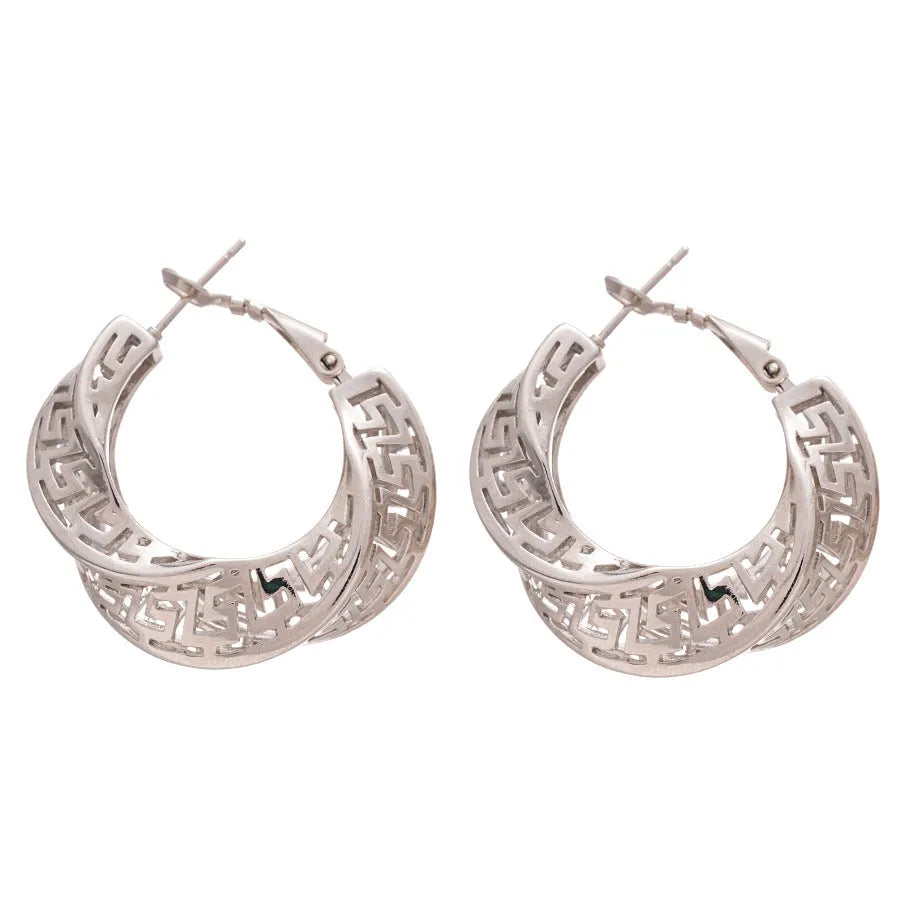 Women's geometric hollow stud earrings with twisted round design in gold or silver