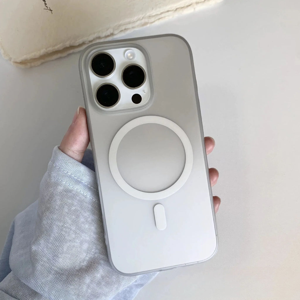 Gradient frosted magnetic suction case for iPhone on a table, showing ultra-thin profile and colour blend.