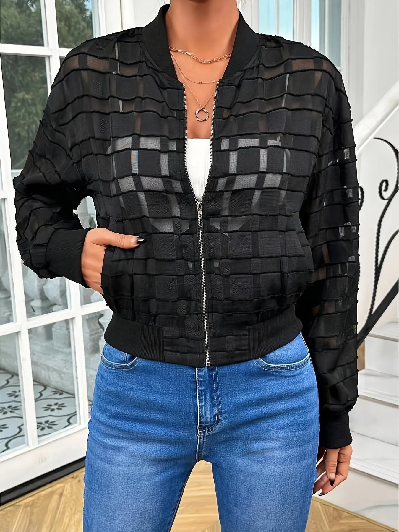 Black women's casual jacket with geometric pattern and thread zipper.