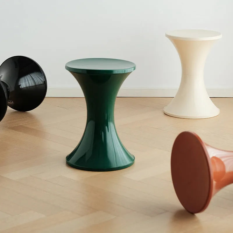 Plastic hourglass-shaped shoe changing stool in selected colour, low height seat for children, adults, elderly.