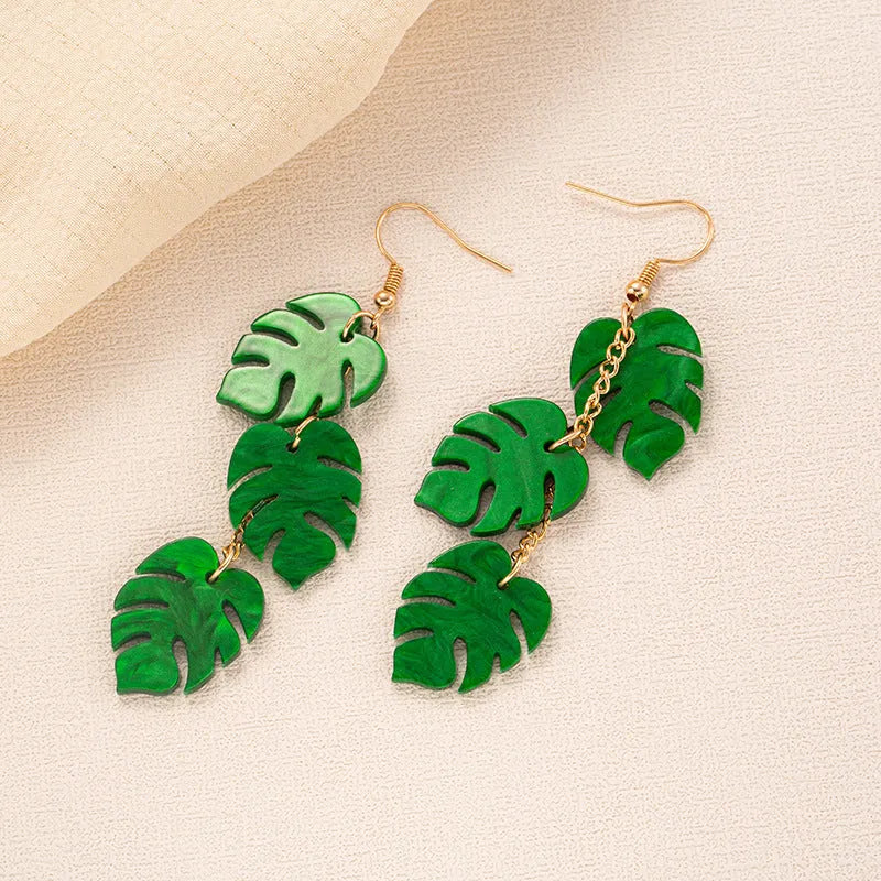 Acrylic drop earrings with coconut texture on alloy hooks, shown in one of five colour styles.