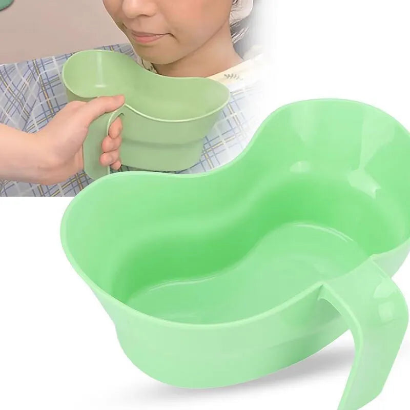 Green plastic bedridden care mug with flexible angled drinking tube