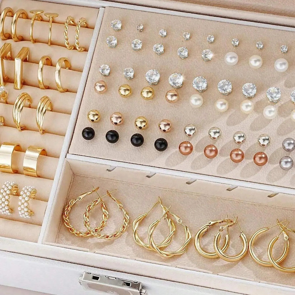 108-piece gold and yellow geometric round pearl earrings multipack on a flat surface.
