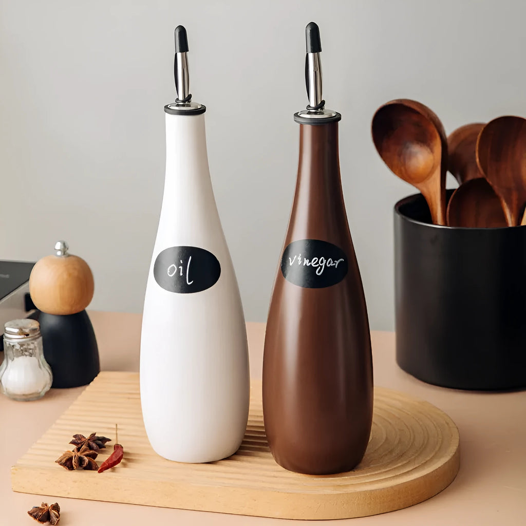 Ceramic oil pot with 650ml funnel and brush for kitchen oil storage in black, coffee, or white
