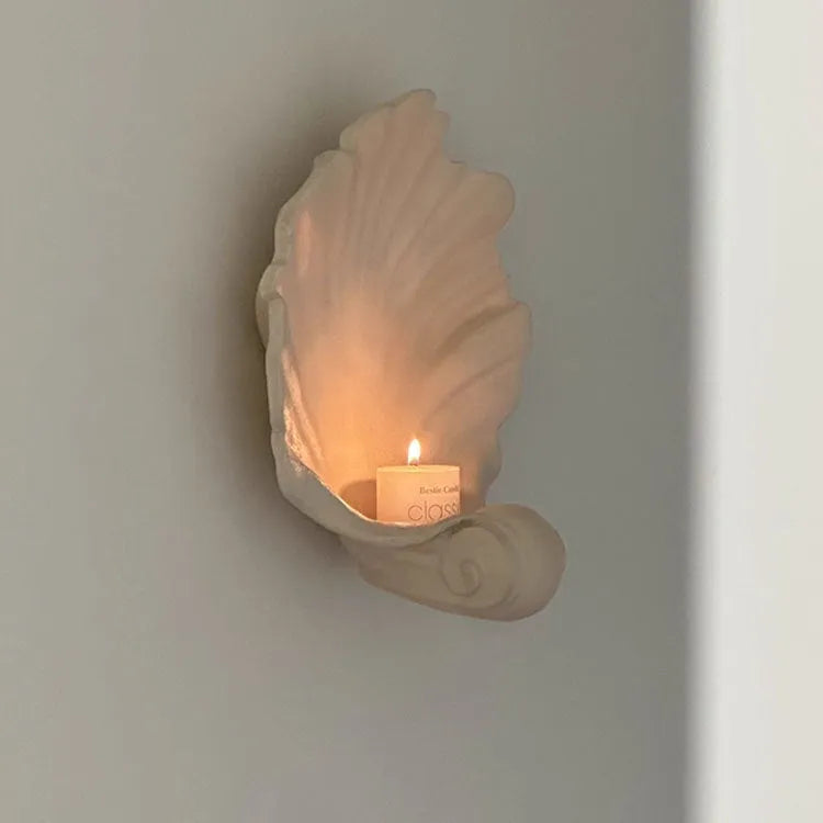 White resin fruit plate decoration with simulation shell design on table