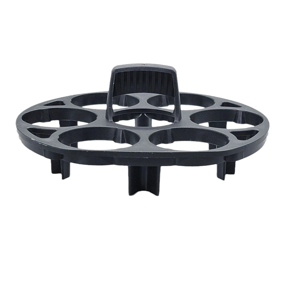 Black modern plastic egg holder rack on a kitchen surface.