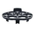 Black modern plastic egg holder rack on a kitchen surface.