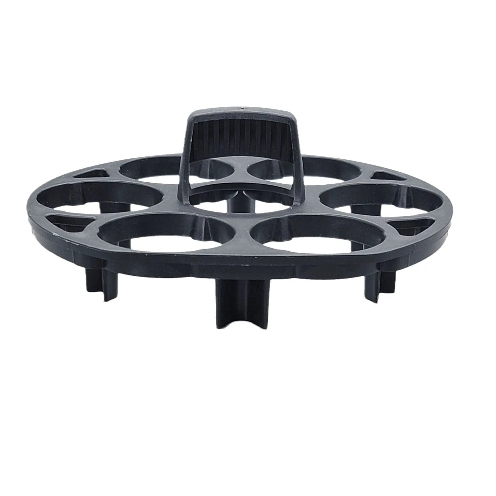 Black modern plastic egg holder rack on a kitchen surface.