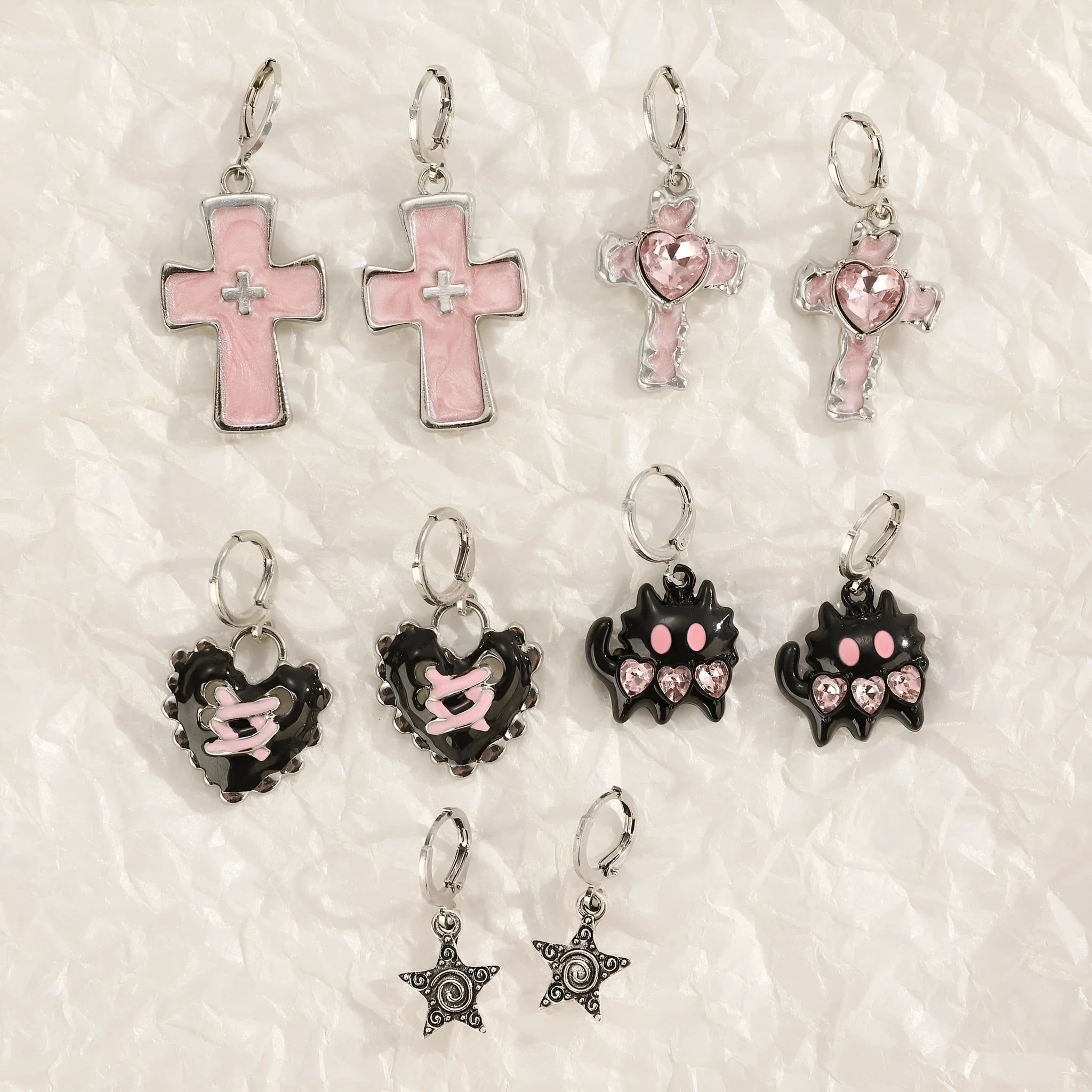 Women's alloy earrings with cross designs in white, bright black, and antique silver colour options
