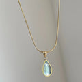 Retro blue and green water drop necklace with mixed gem inlaid pendant on titanium steel snake bones chain