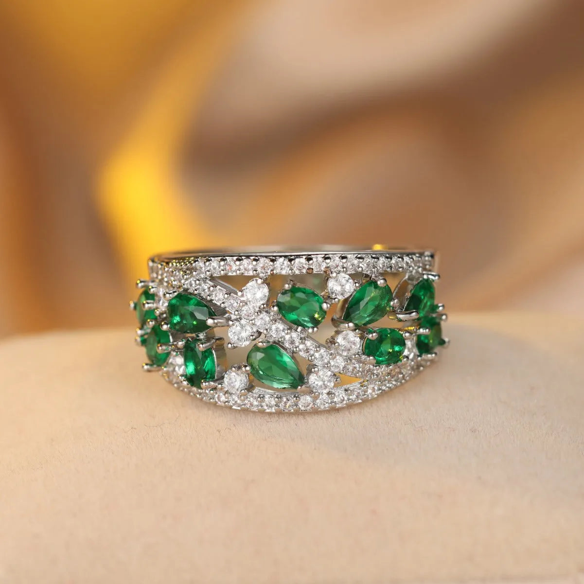Women's hollow round copper fashion ring shown in gold and platinum with white diamond or blue sapphire accents.
