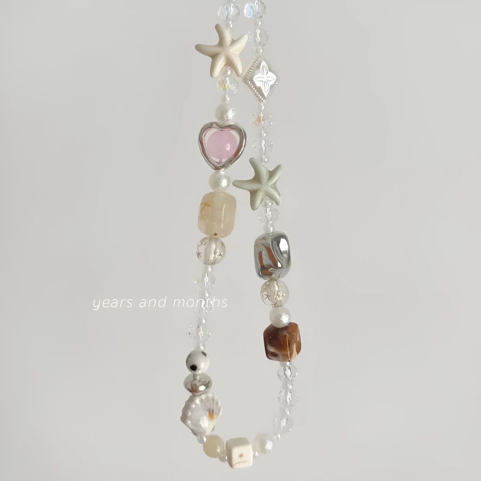 Bohemian sweetheart design mobile phone charm with beaded elements in island sweetheart colour
