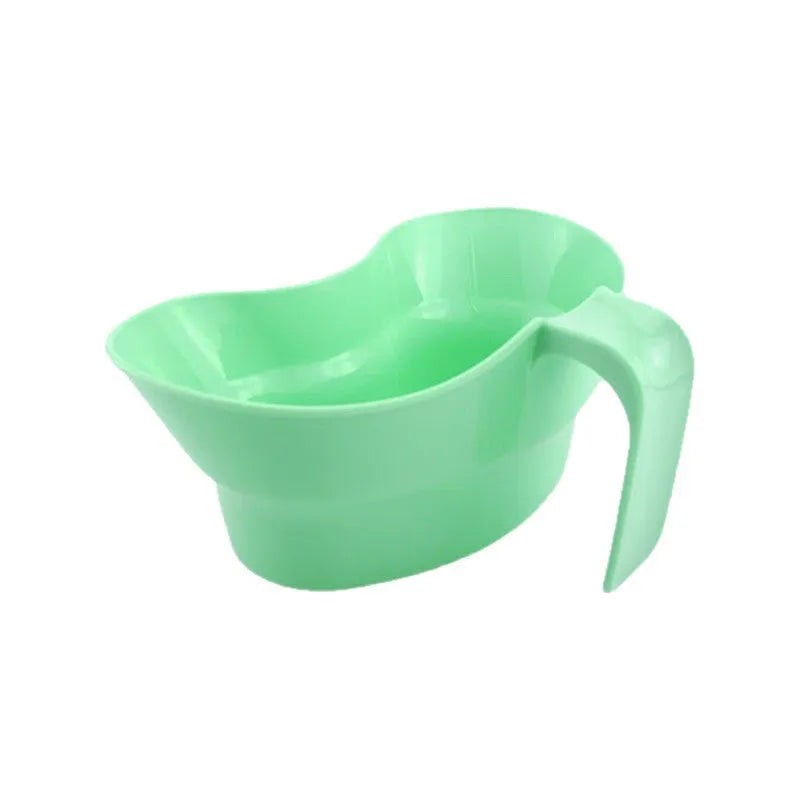 Green plastic bedridden care mug with flexible angled drinking tube