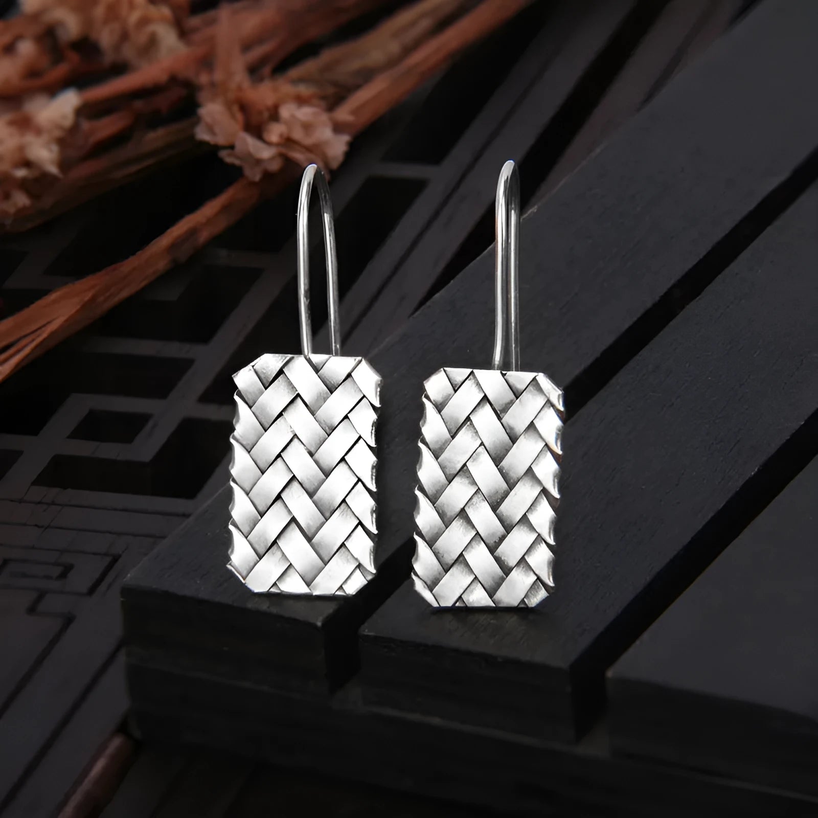 Silver geometric woven diamond plaid earrings measuring 17.5mm by 11mm