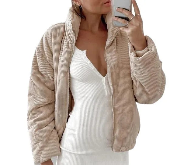 Apricot women's corduroy wadded jacket with a stand collar and front zip.