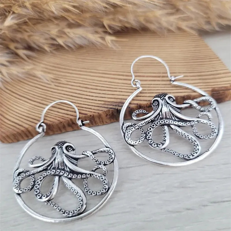 Vintage silver octopus earrings with zinc alloy construction and electroplated antique finish