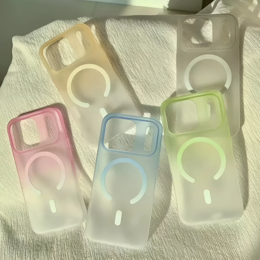 Gradient frosted magnetic suction case for iPhone on a table, showing ultra-thin profile and colour blend.