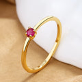 Copper geometric women's ring with single diamond centrepiece in fine circle band design