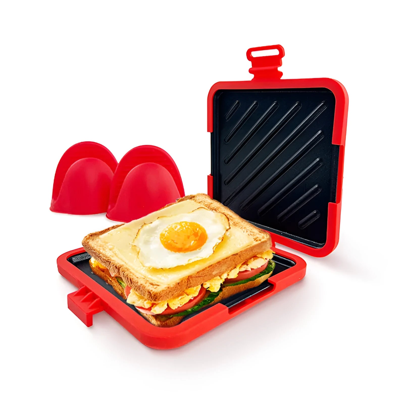 Red silicone baking tray with matching anti-slip oven gloves on kitchen counter