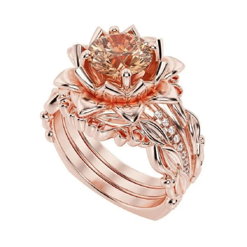Geometric flower design ring with zircon ornaments in electroplated alloy, showing colour options.