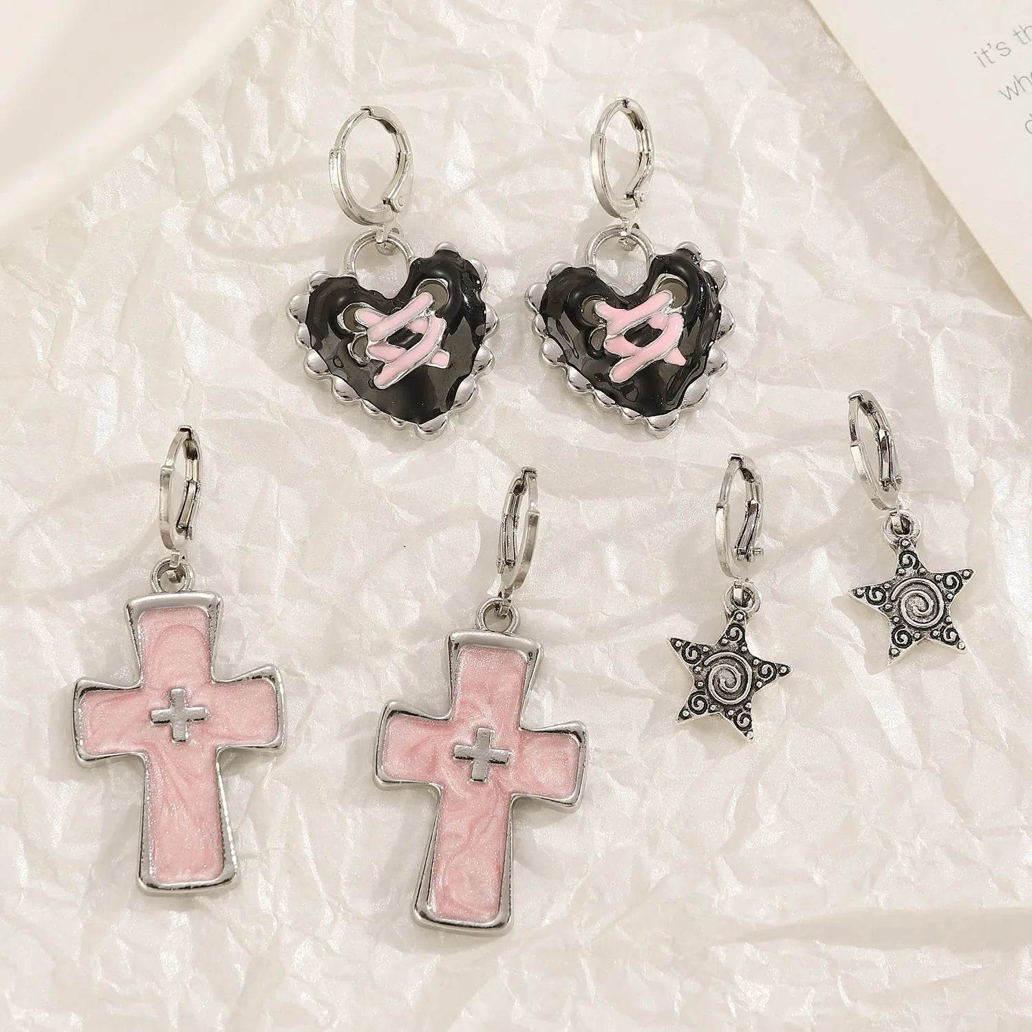 Women's alloy earrings with cross designs in white, bright black, and antique silver colour options