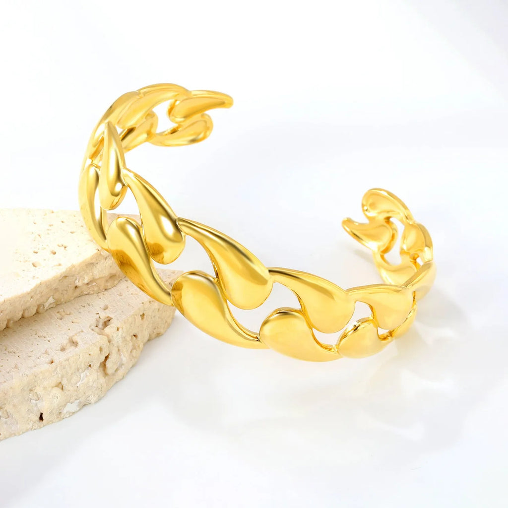 Women's stainless steel alloy bracelet with advanced European American trend styling in silver and gold colour variants