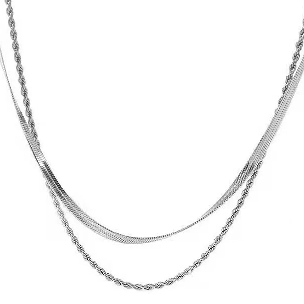 Women's adjustable double-layer twist necklace in stainless steel with a geometric titanium steel pendant.