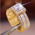 Geometric style women's alloy ring in gold or white electroplated finish on a UK size chart.