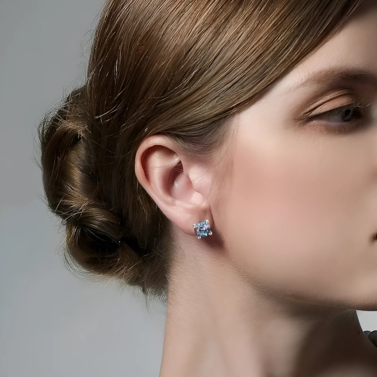 Geometric cultivate Alexandrite stone colour ear studs made from 925 silver.