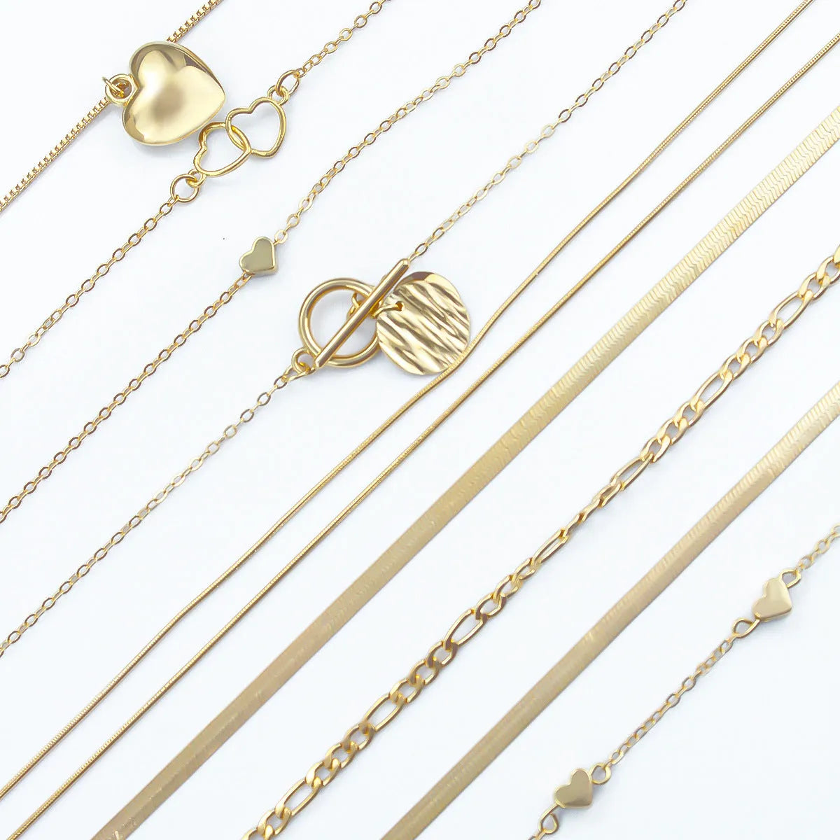 10-piece gold women's necklace set with adjustable snake bone chain and alloy pendants