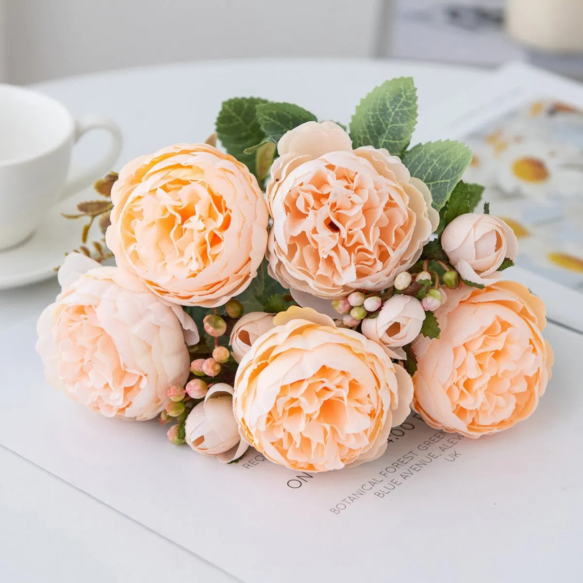 A silk artificial peony flower bouquet in a champagne colour, suitable for wedding or home decoration.
