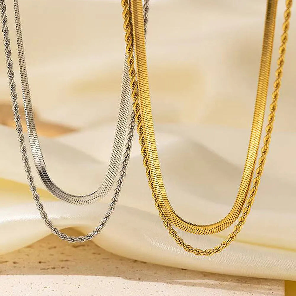 Women's adjustable double-layer twist necklace in stainless steel with a geometric titanium steel pendant.