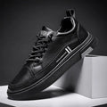 Men's white low-top skate shoes with elastic band closure and rubber sole.