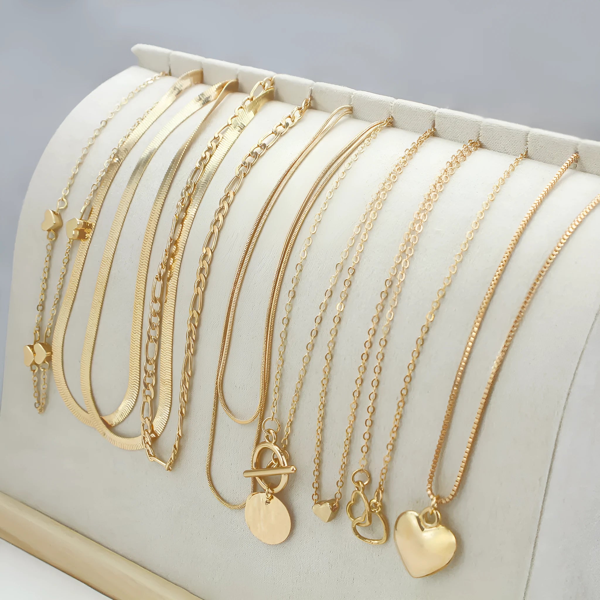 10-piece gold women's necklace set with adjustable snake bone chain and alloy pendants