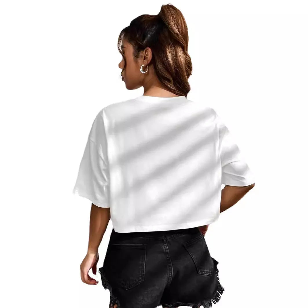 Black loose-fit cotton crop top t-shirt with printed white English letters, short sleeves, and an exposed navel.
