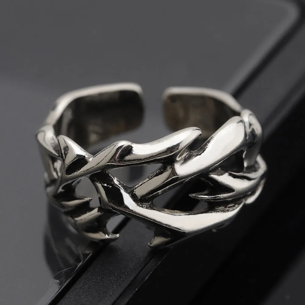 Adjustable copper ring with geometric thorn flower design in J2150 thorns colour