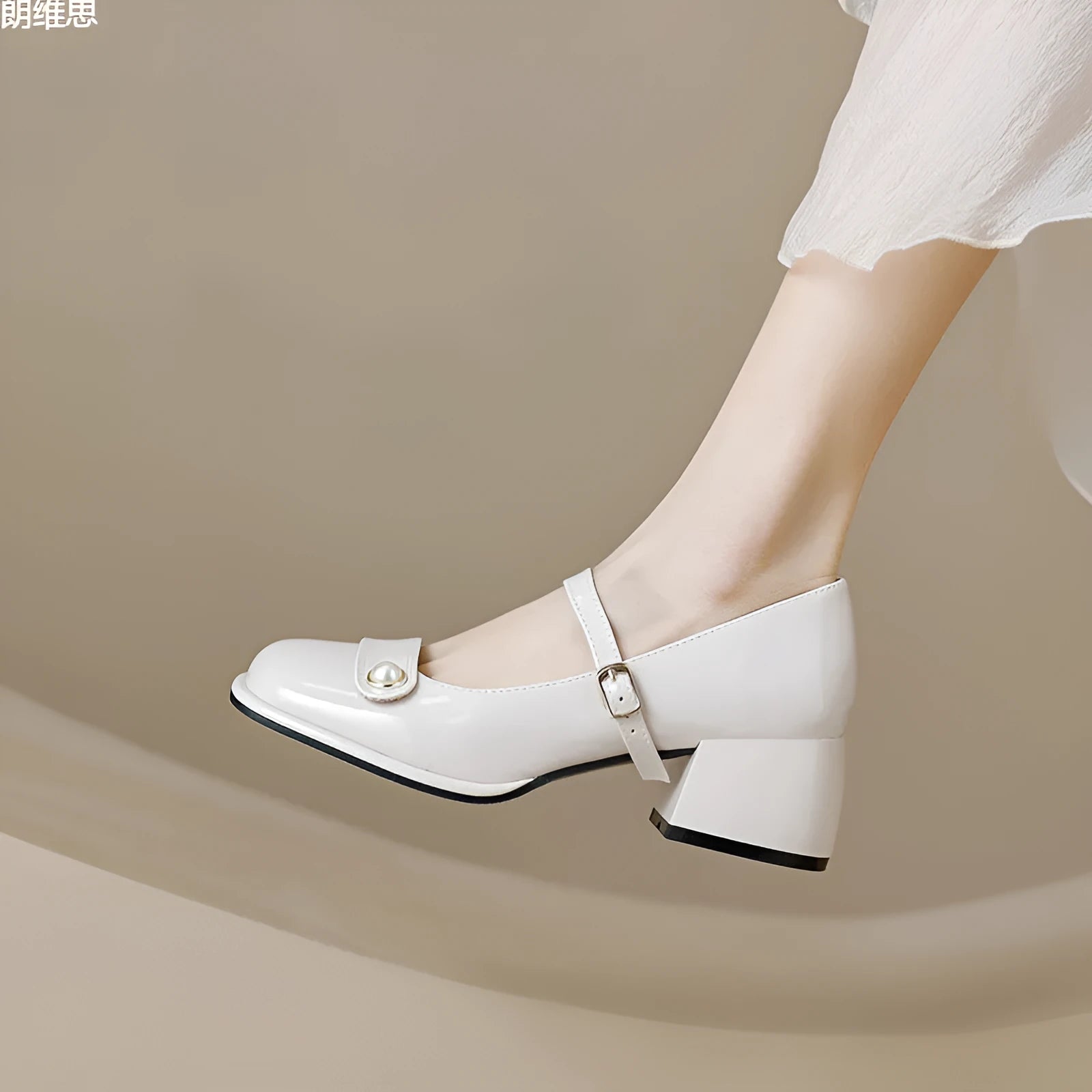 Women's apricot patent leather pumps with chunky heel and square toe, showing buckle ankle strap