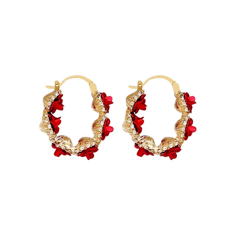 Red floral alloy ear clips with rose design and clip fastening