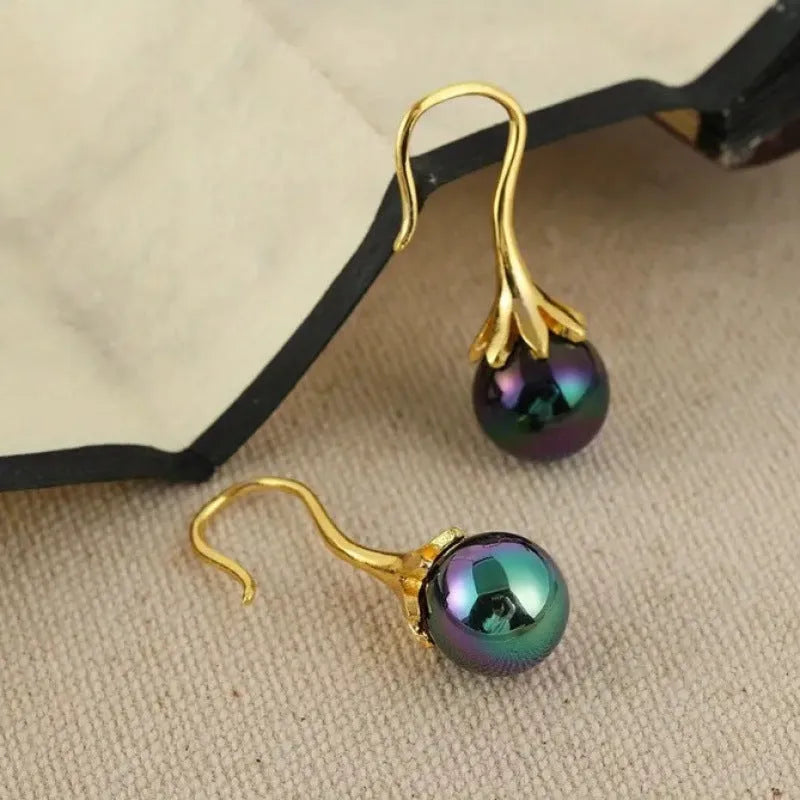 Gold electroplated retro fashion women's earrings with personalised creative design