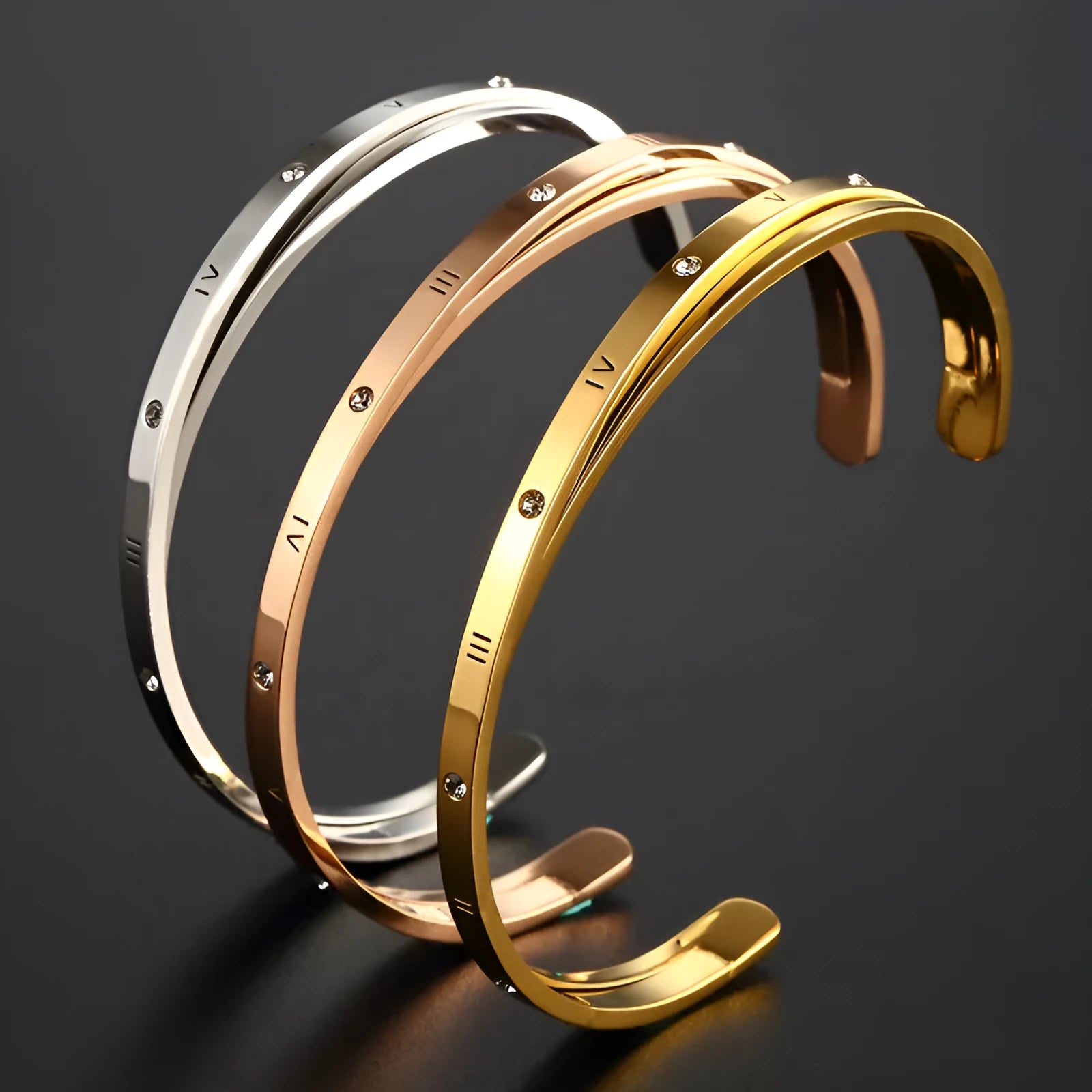 Open-ended stainless steel bracelet with inlaid zircon crystals in a choice of rose gold, gold, or steel colour finish.
