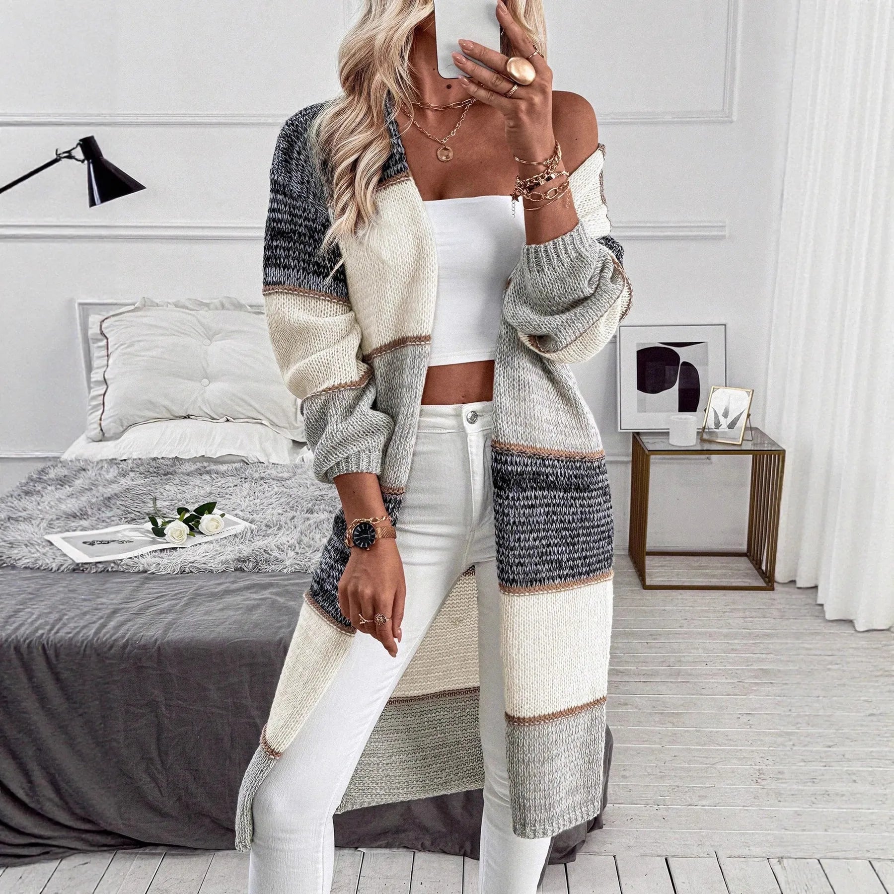 Grey women's knitted long cardigan with loose fit and stripe pattern