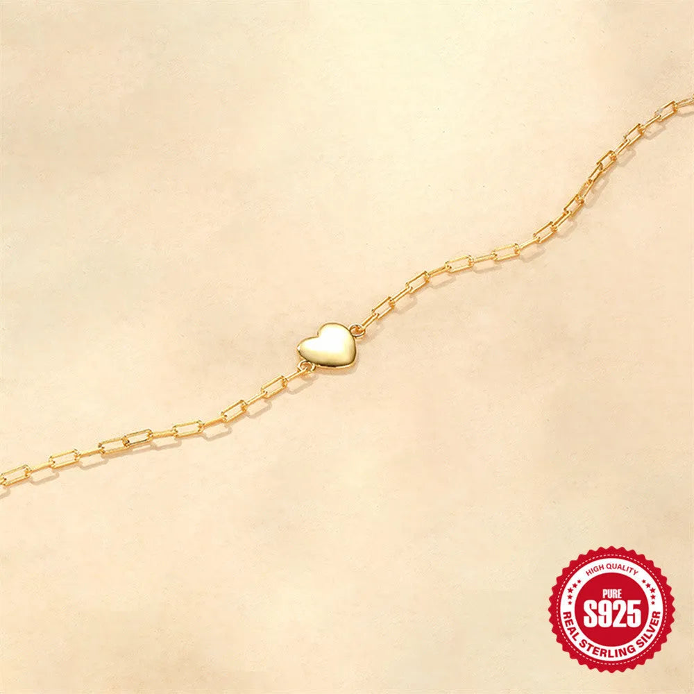 S925 sterling silver bracelet with clip chain clasp and geometric heart charm