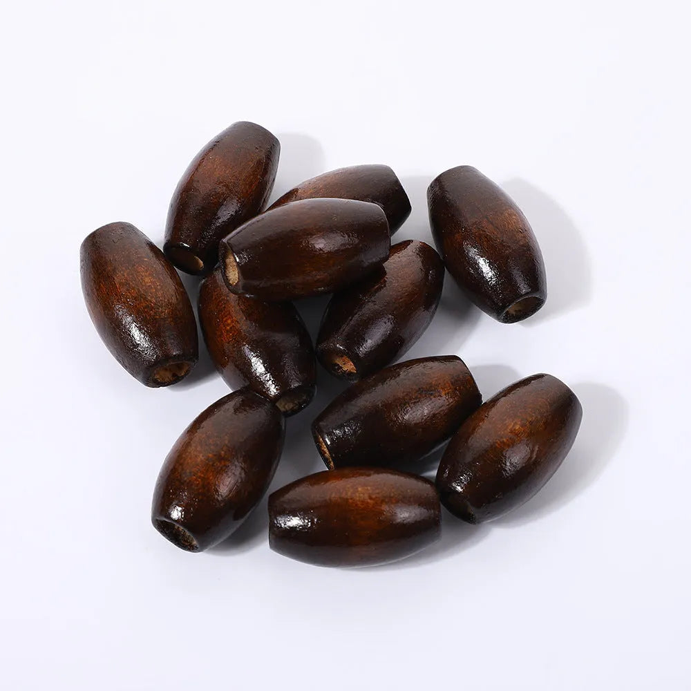 Oval wooden bead with M-shaped raised profile in dark coffee colour, 25mm size with visible centre hole