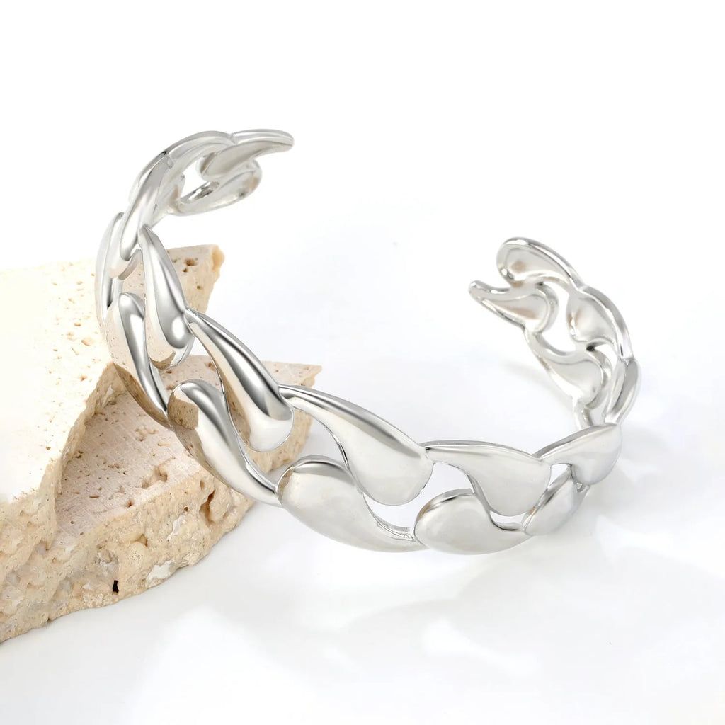 Women's stainless steel alloy bracelet with advanced European American trend styling in silver and gold colour variants