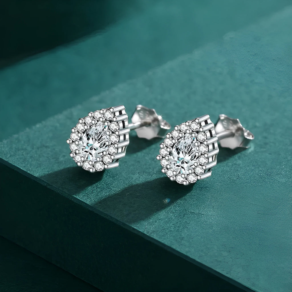 Women's silver water drop ear studs with diamond treatment and 925 sterling silver construction