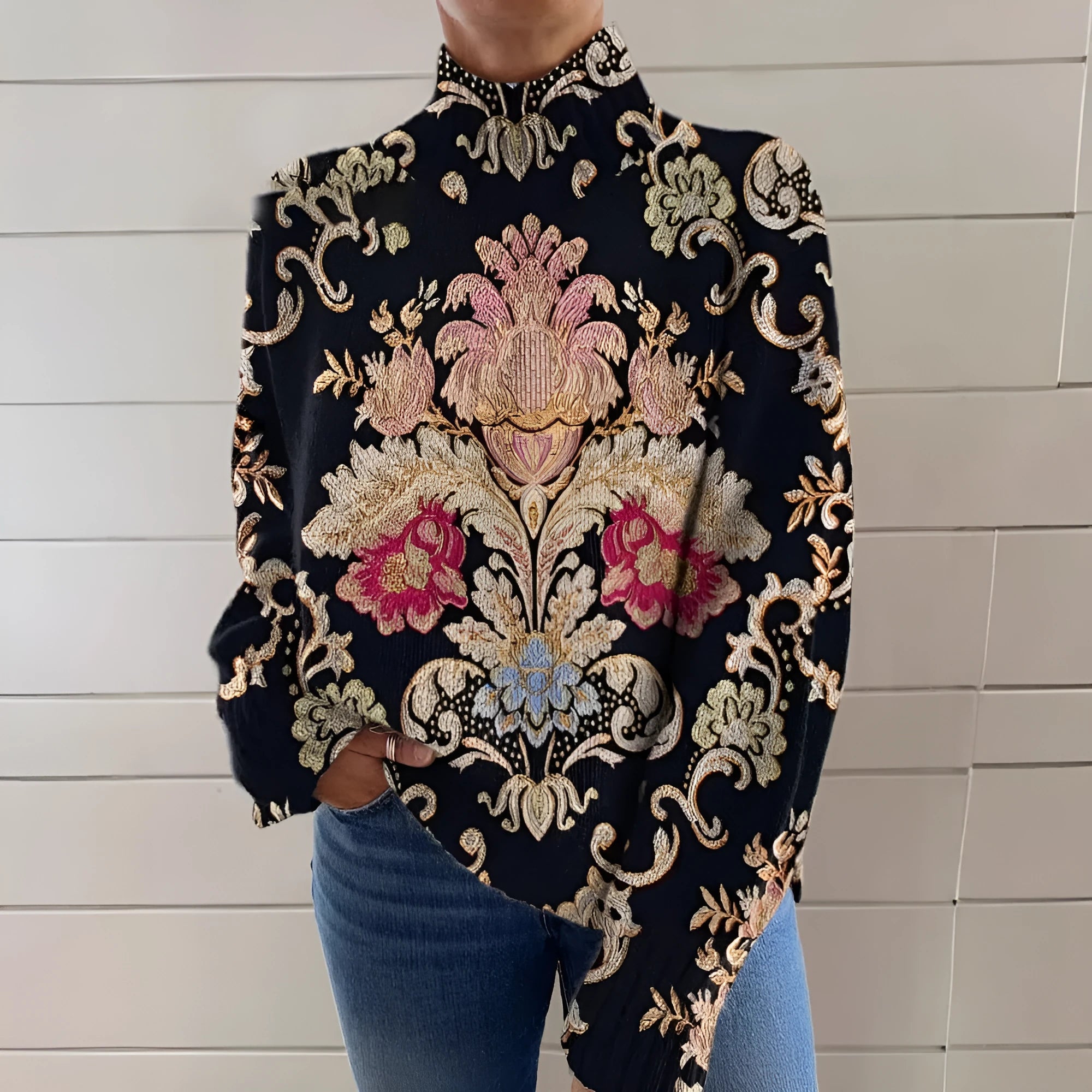 Black 3D pattern printed turtleneck long sleeve loose fit sweater on a hanger.