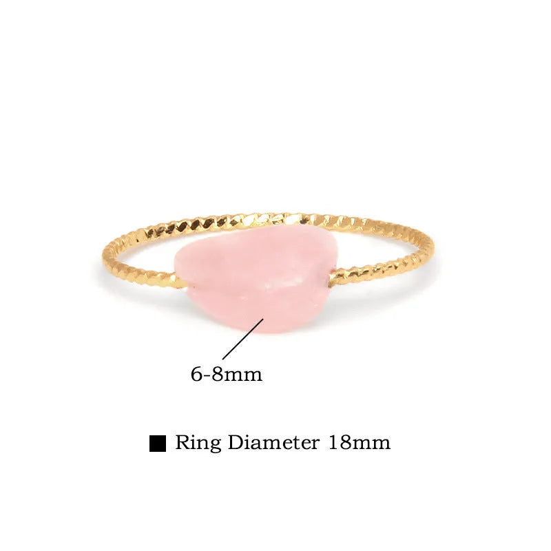 Geometric shaped agate ring for women in a solid colour on a neutral background.